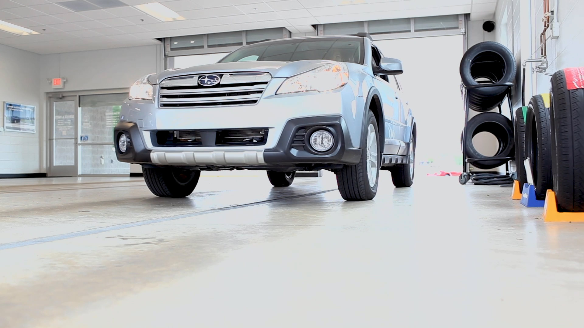 Factory trained experts rotate tires on a Subaru