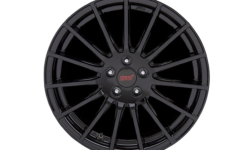 <br>STI 15-Spoke Black Alloy Wheels<sup>21</sup>. Straight from Subaru Tecnica International—stiff, light, and mean.